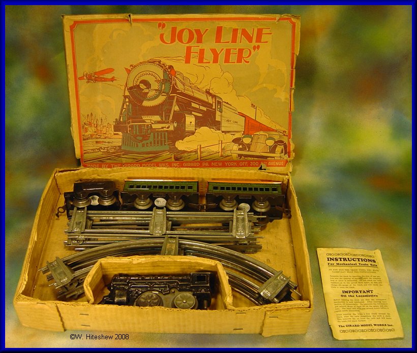 Joy Line Clockwork Cast Iron Engine and Passenger Set
